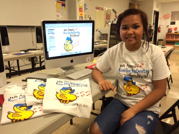Mirielle Pangan displays her winning artwork in the Ken-Ducky Derby T-shirt Design Contest